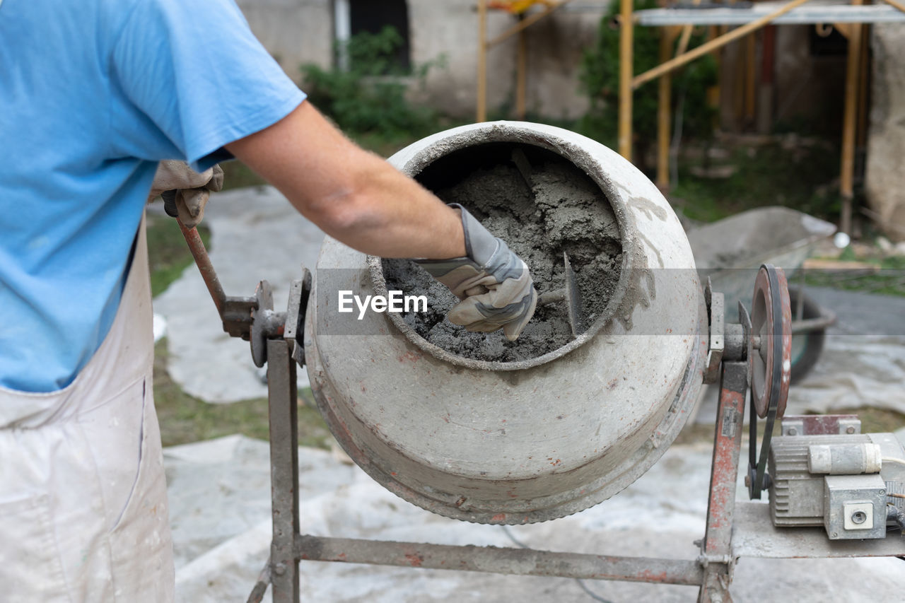 midsection of man working at construction site