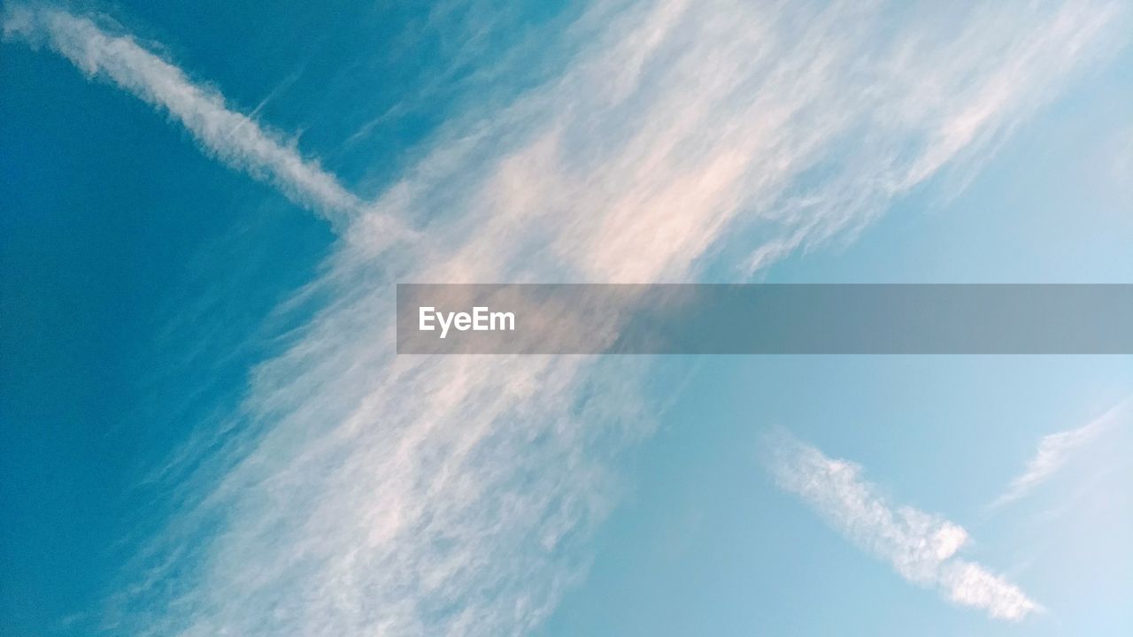 Low angle view of vapor trail in sky