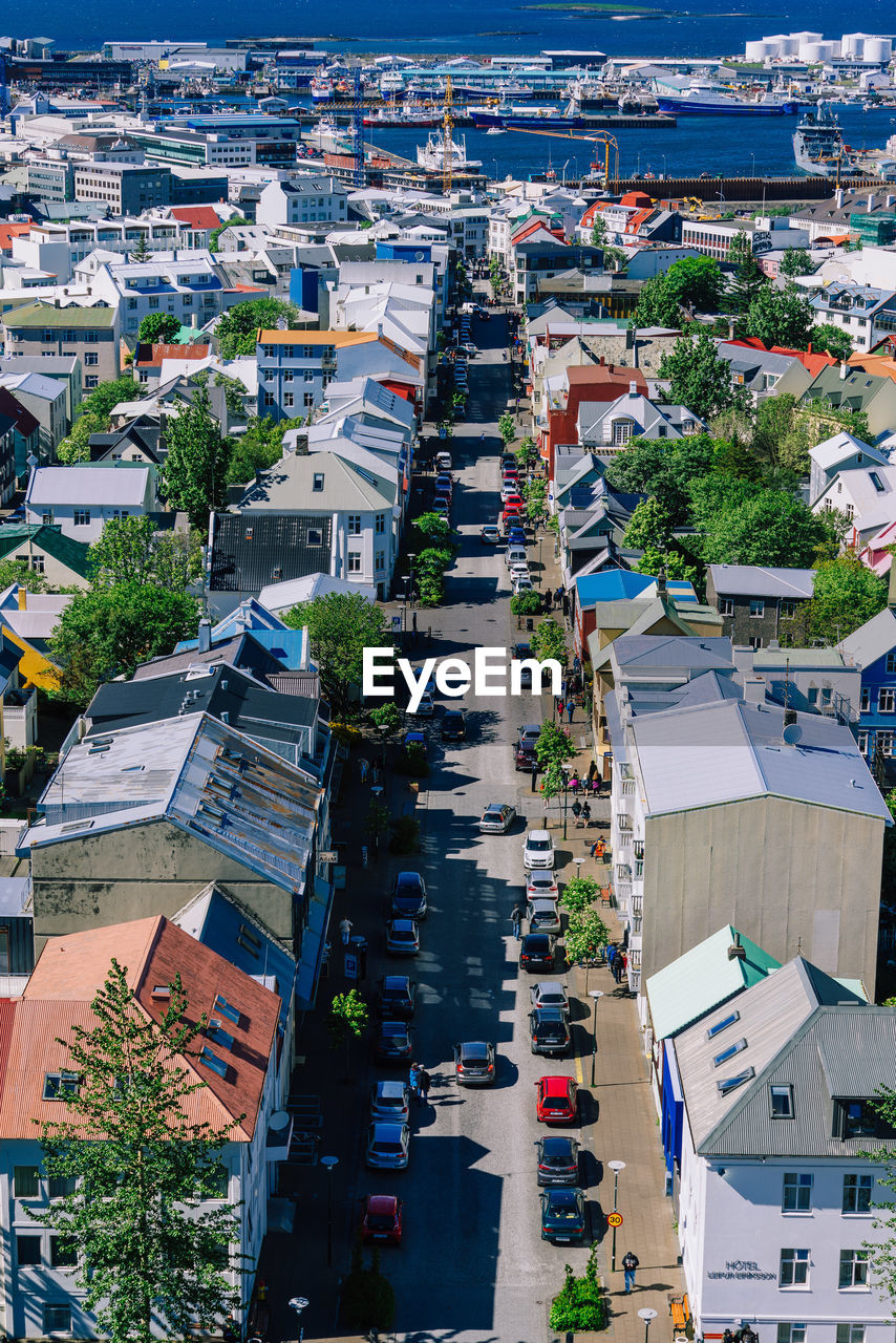 High angle view of street amidst buildings in city