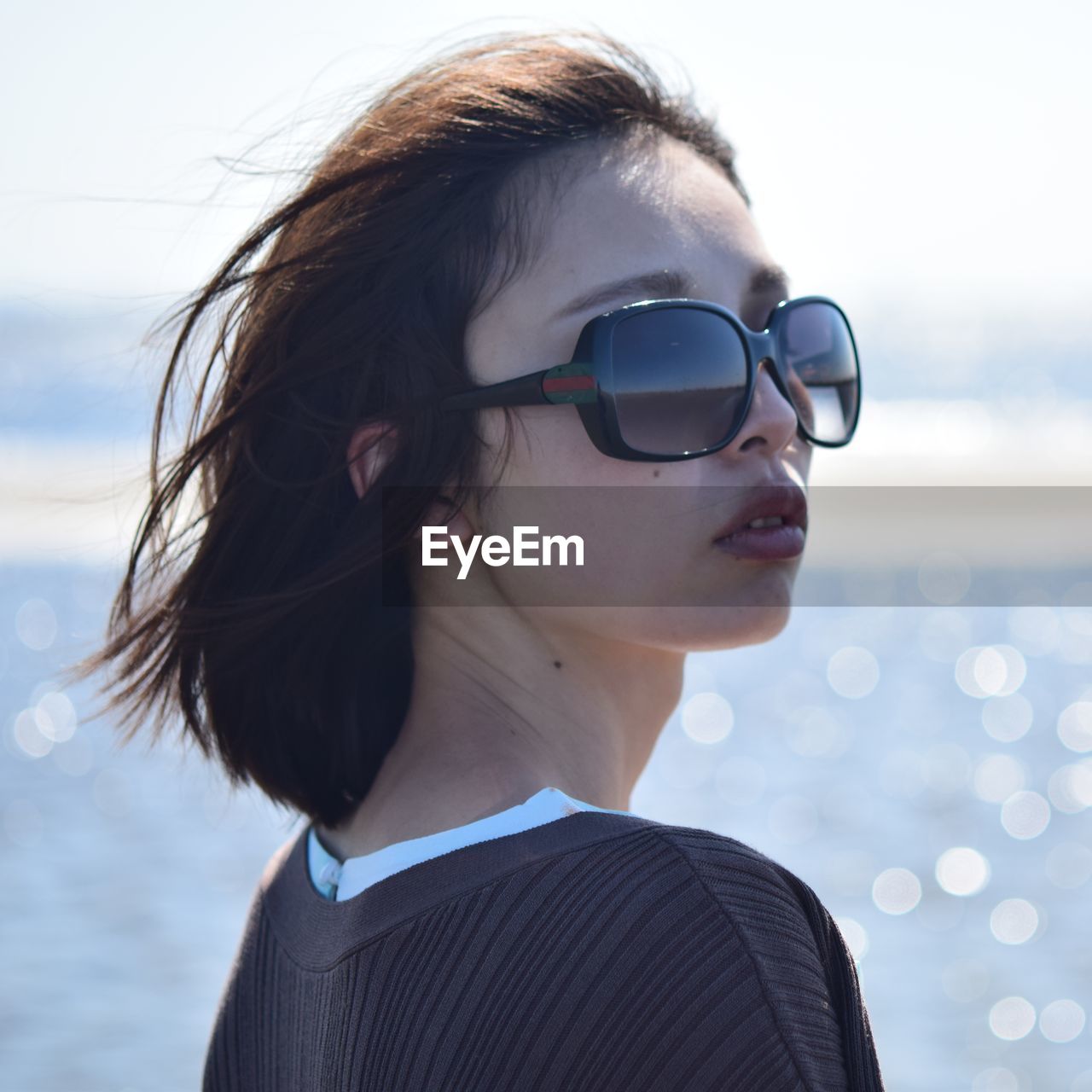 Portrait of young woman wearing sunglasses