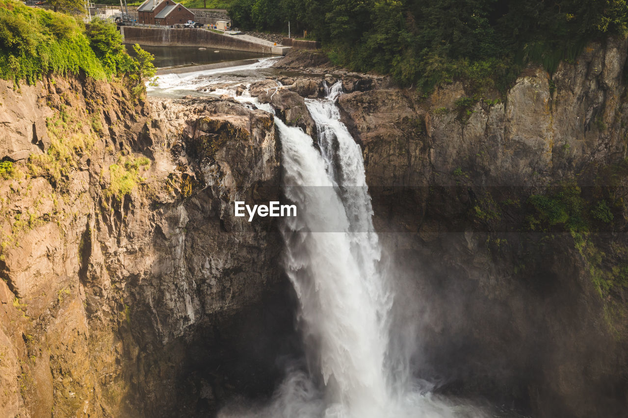 VIEW OF WATERFALL IN FOREST