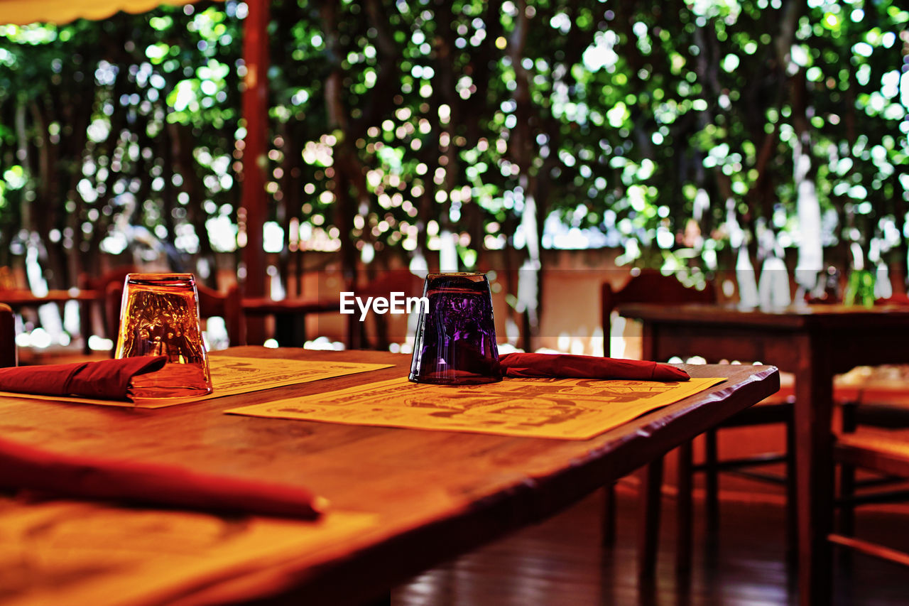 Empty chairs and table at cafe