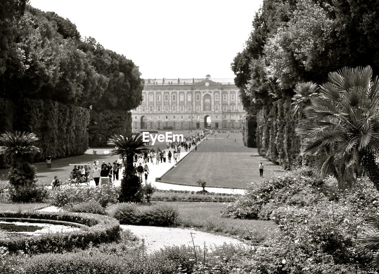 BUILT STRUCTURE WITH TREES IN FOREGROUND