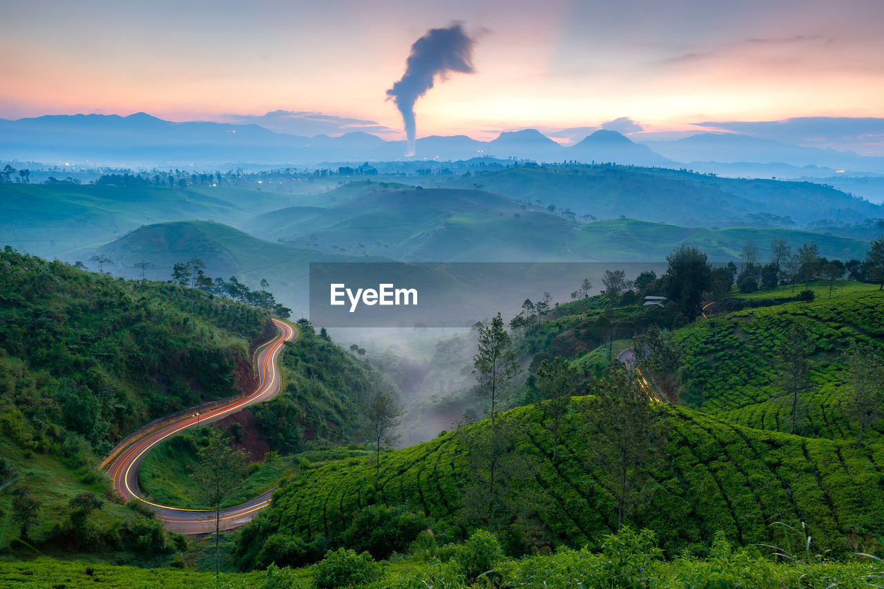 Scenic view of landscape against sky during sunset
