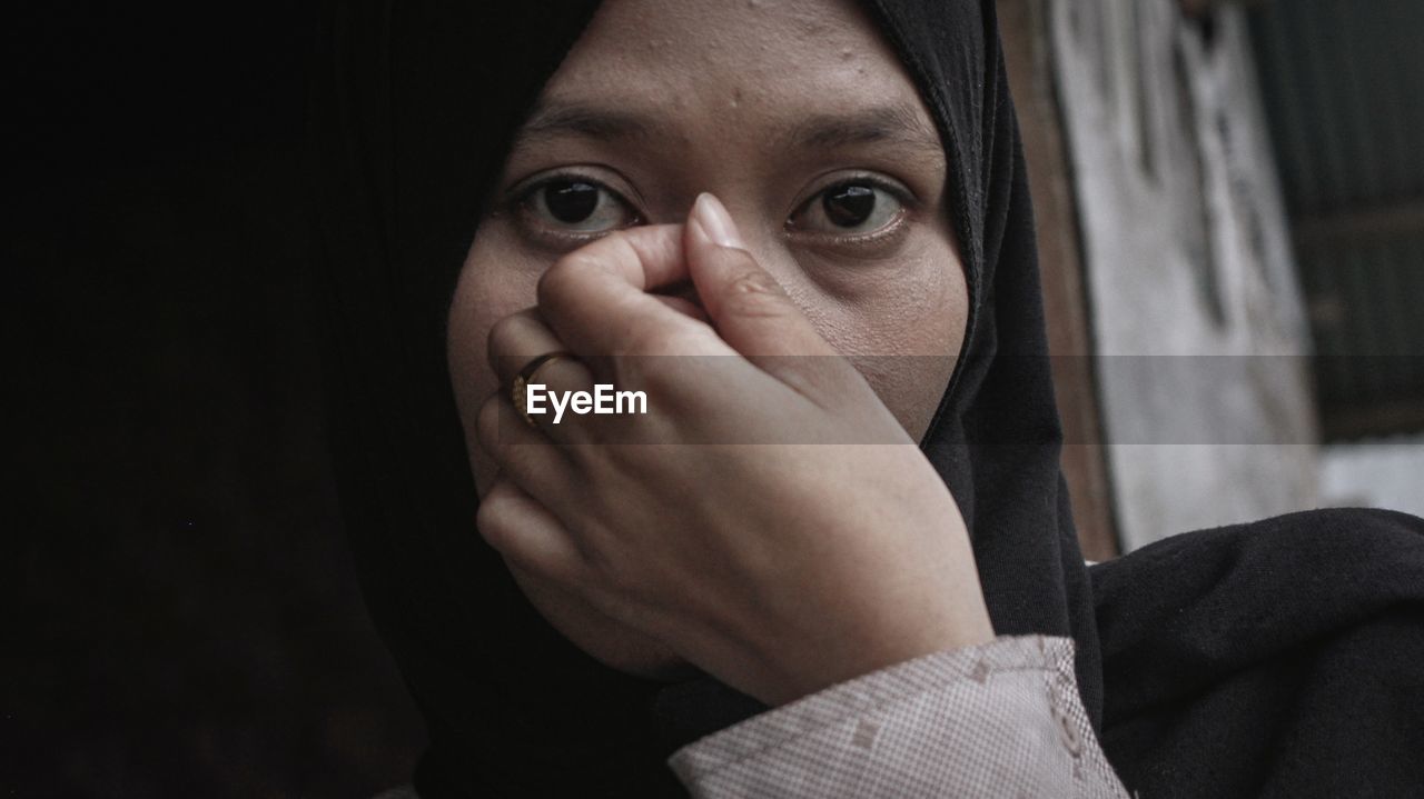 Close-up portrait of woman wearing hijab