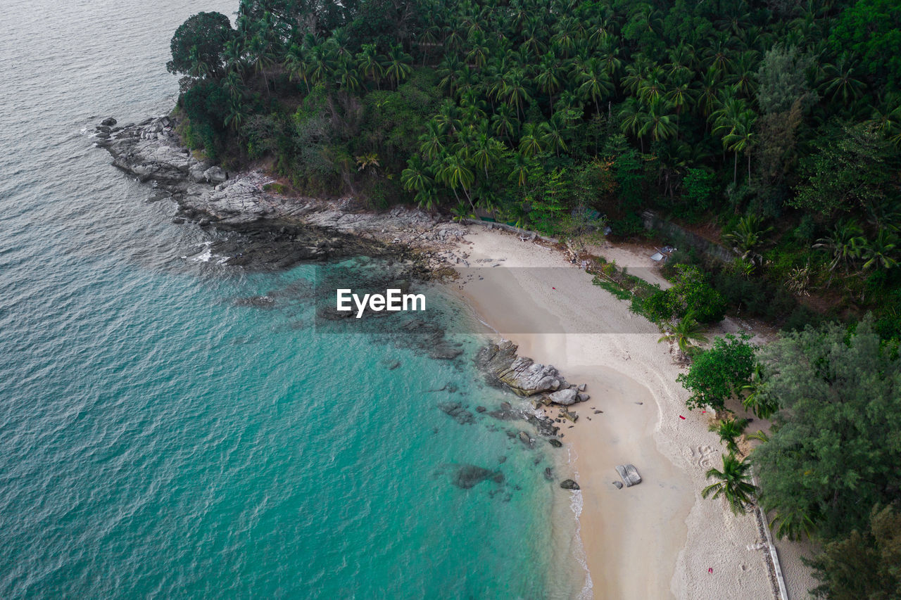 HIGH ANGLE VIEW OF SURF ON SHORE