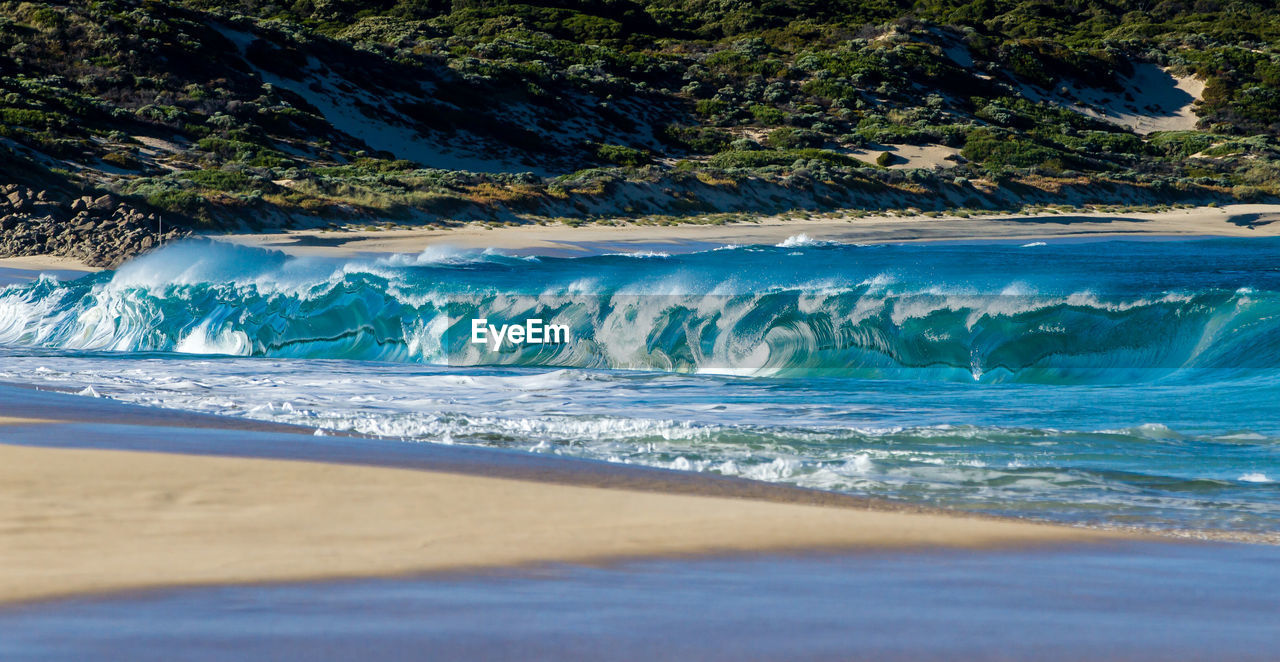 Scenic view of waves in sea