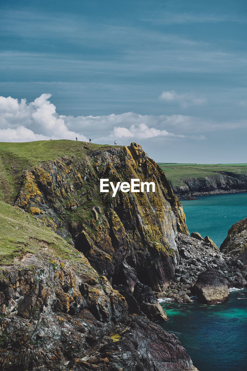 Scenic view of sea against sky at kynance cove in cornwall, england