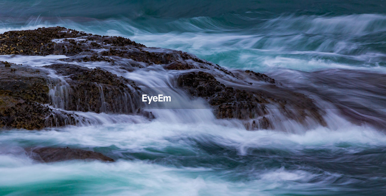 Scenic view of waterfall