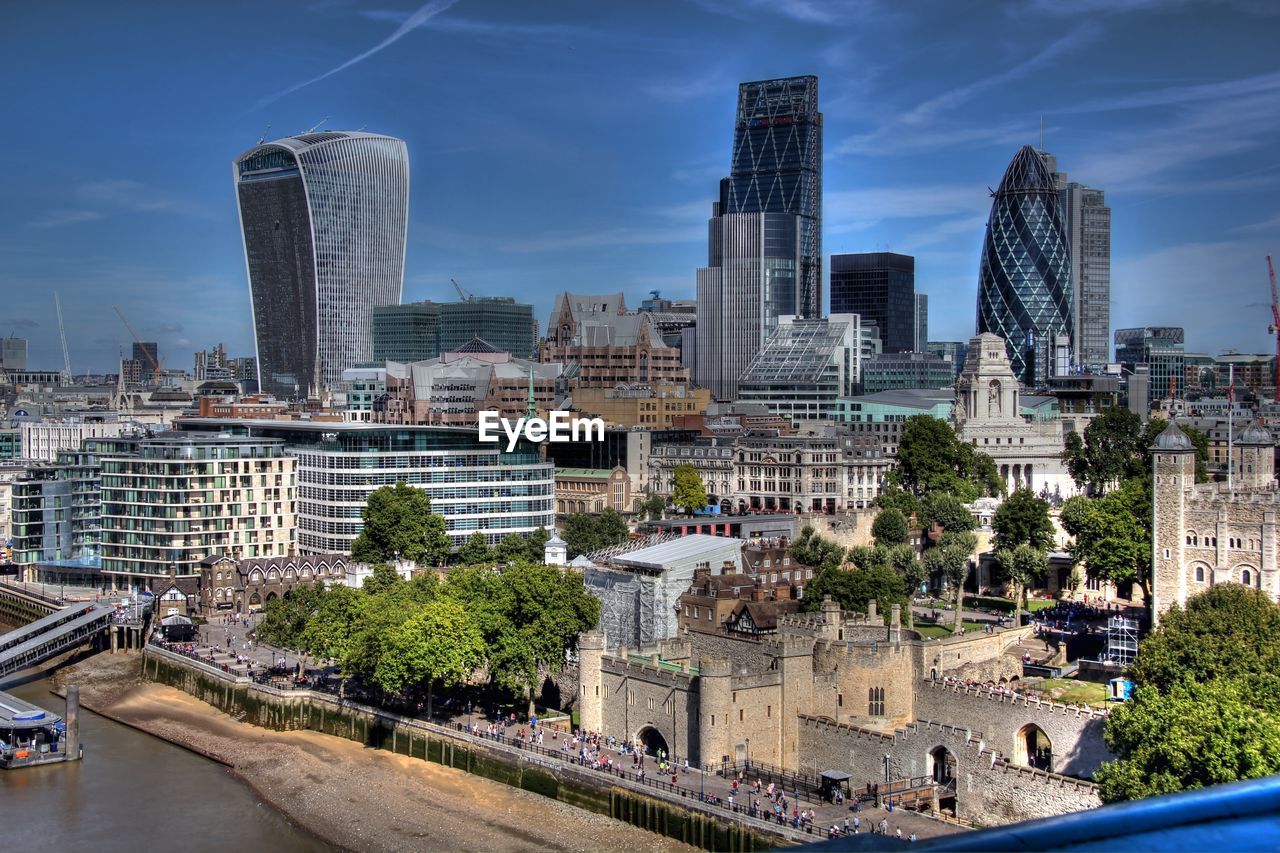 Buildings in city against sky