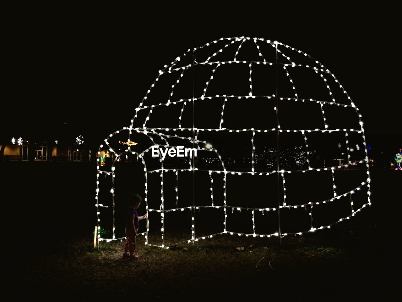 Illuminated decoration on field at night