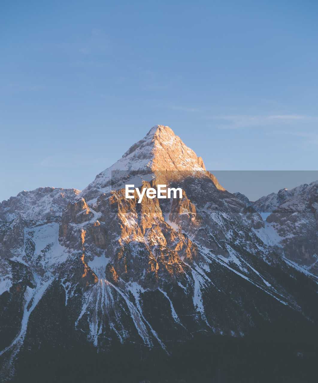 Snow covered mountain against sky