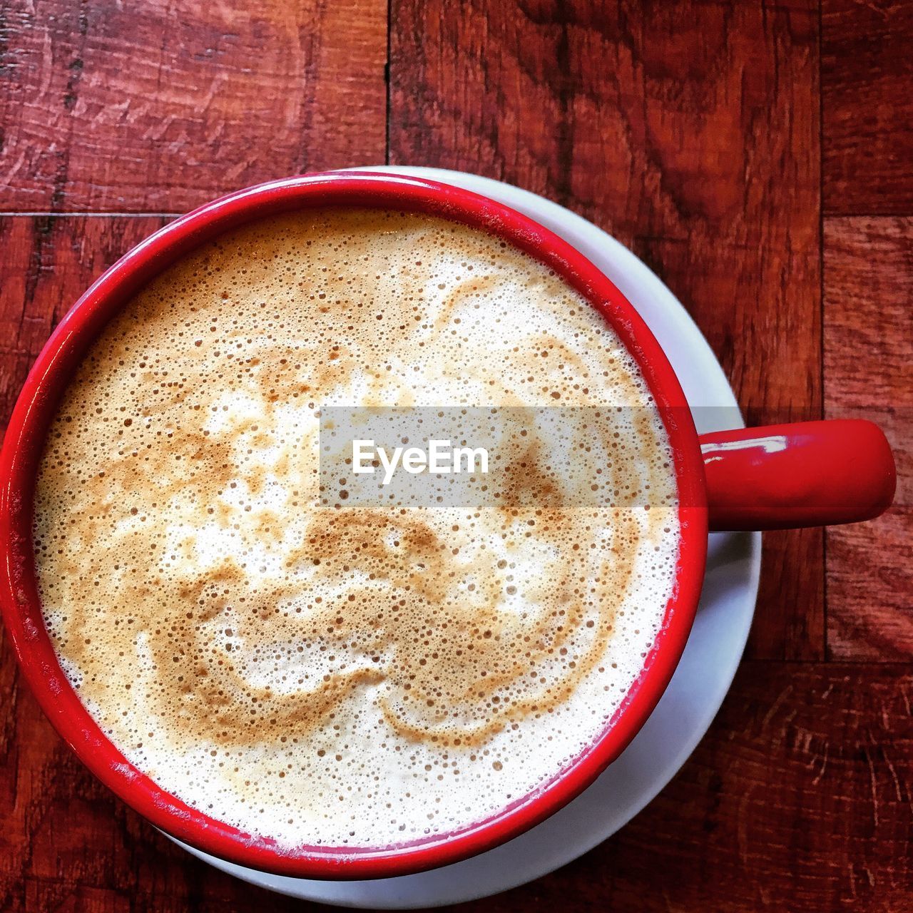 High angle view of coffee in cup on table