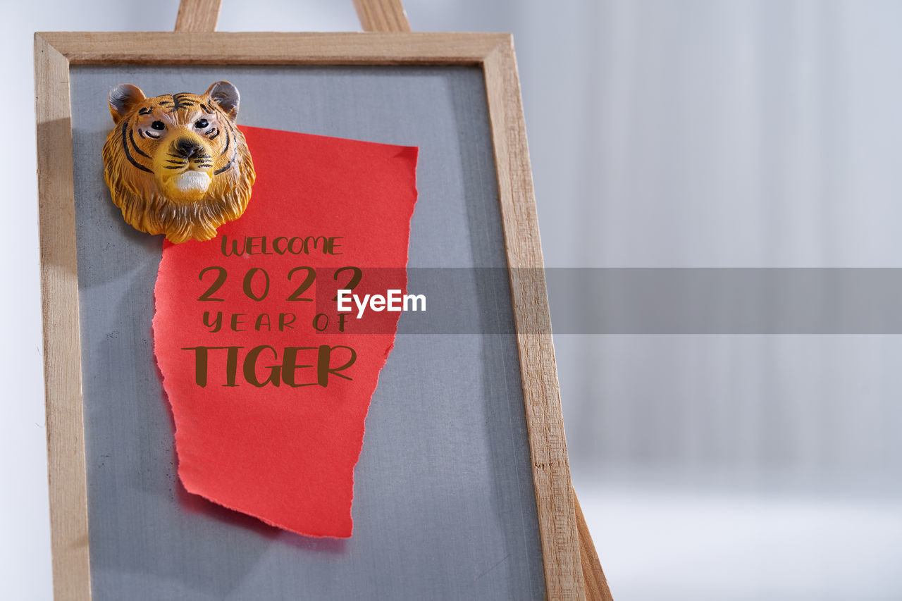 Magnetic board with decorative tiger head with cophy space- welcome year of tiger