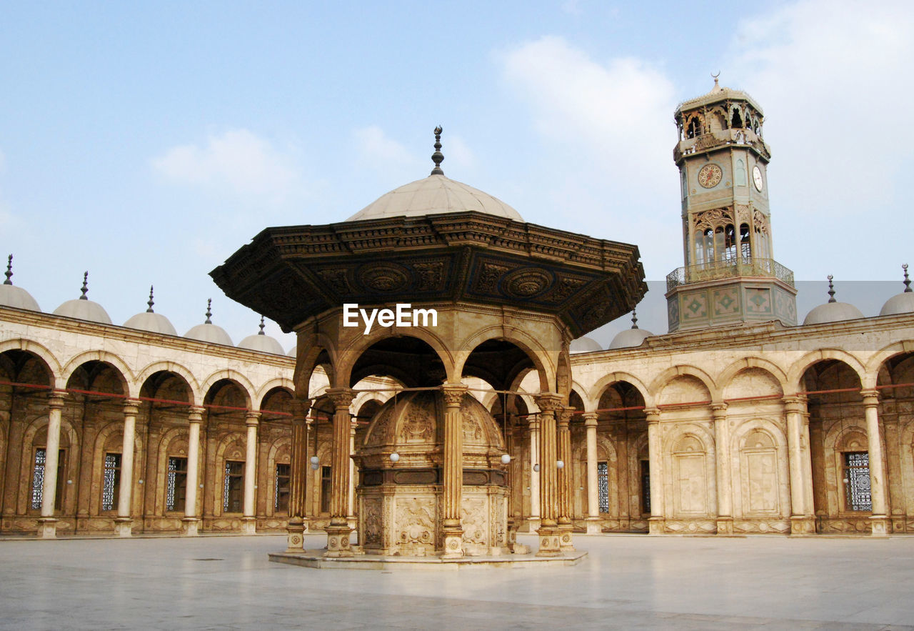 Ancient clock in the courtyard of muhammad ali mosque at cairo, egypt