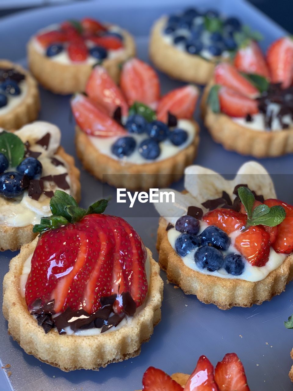 CLOSE-UP OF CAKE WITH STRAWBERRIES