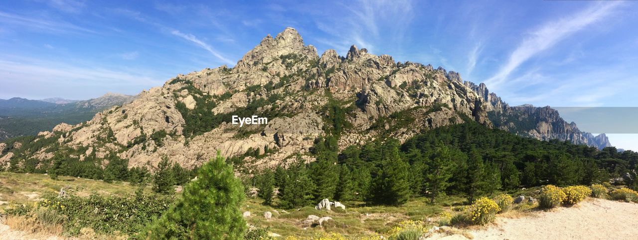 Scenic view of rocky mountains against sky