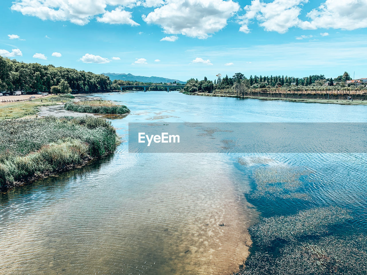 Scenic view of river against sky