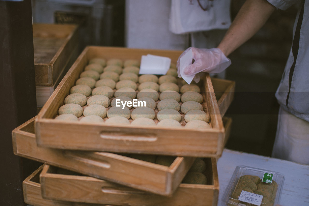 Close-up of man working in bakery