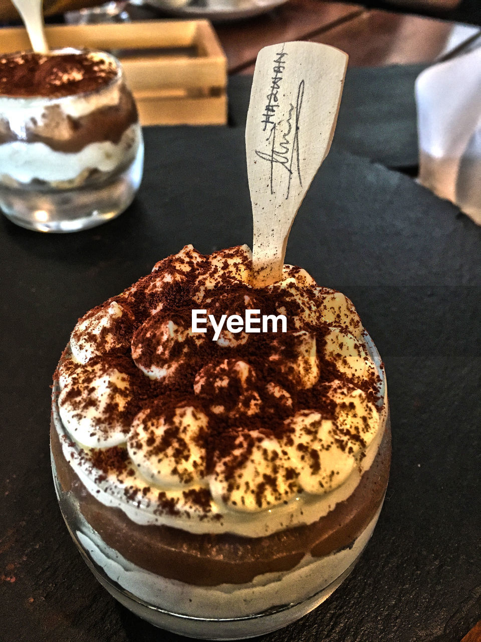 HIGH ANGLE VIEW OF DESSERT IN PLATE ON TABLE