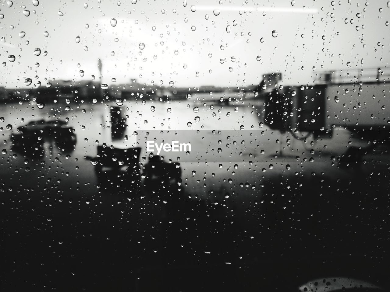 RAINDROPS ON GLASS WINDOW