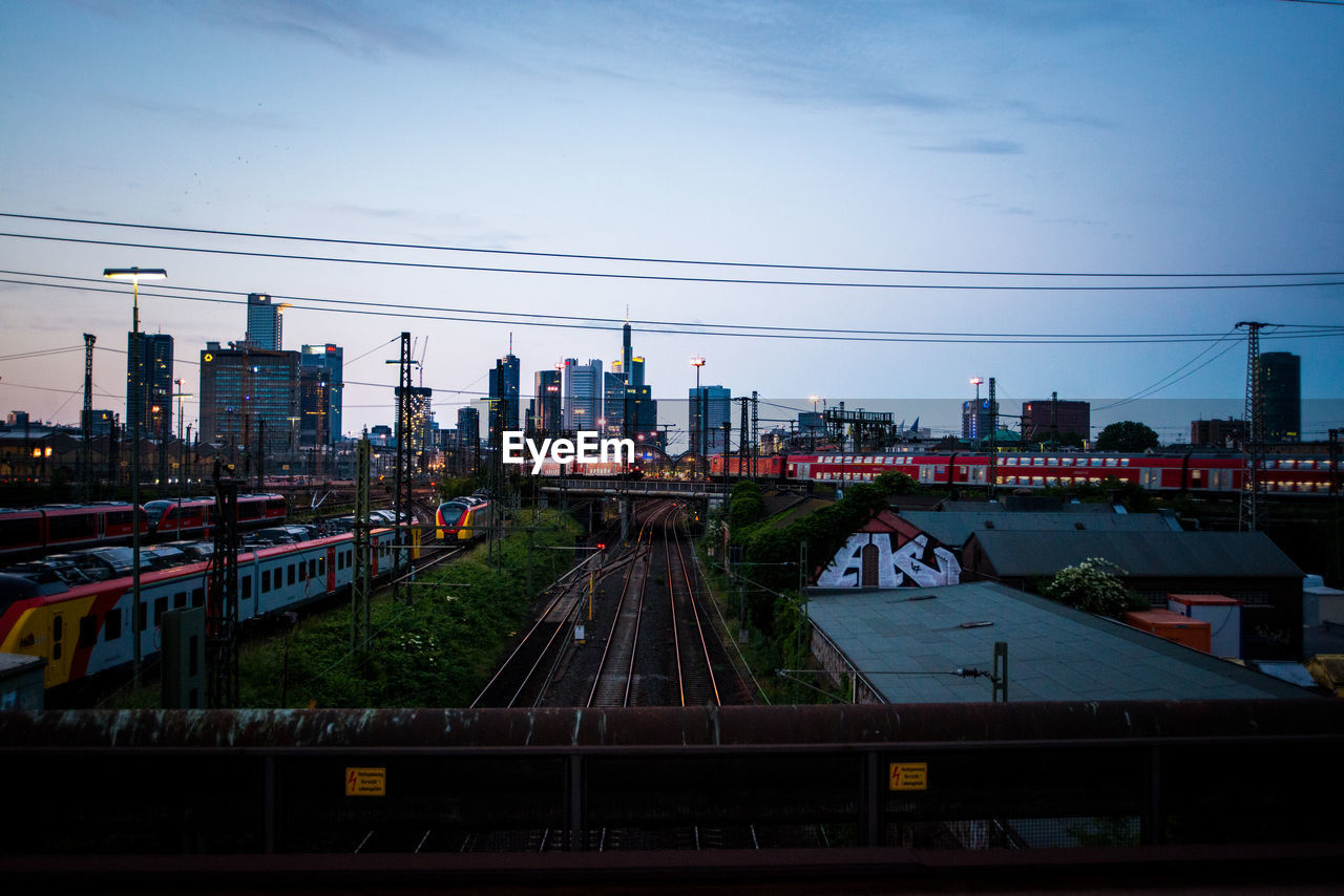 High angle view of train in city against sky in frankfurt, germany 