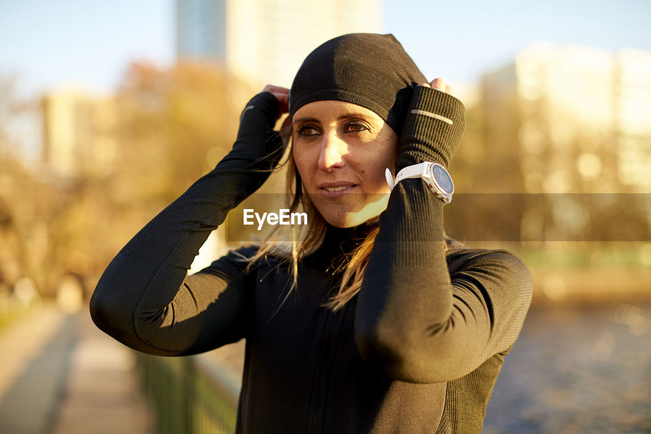 Outdoor portrait of an athletic woman.