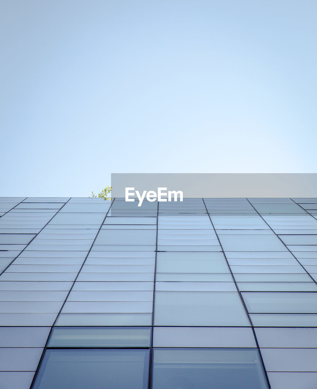 Low angle view of modern building against clear sky