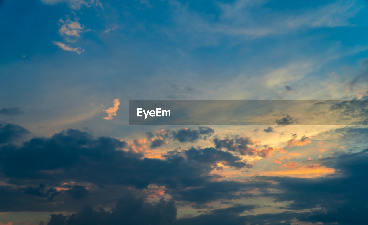 Low angle view of clouds in sky during sunset