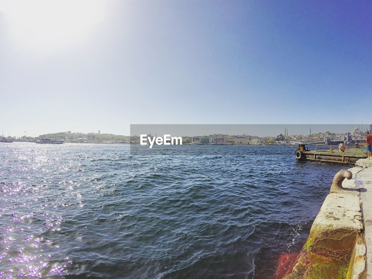 Scenic view of river against clear sky