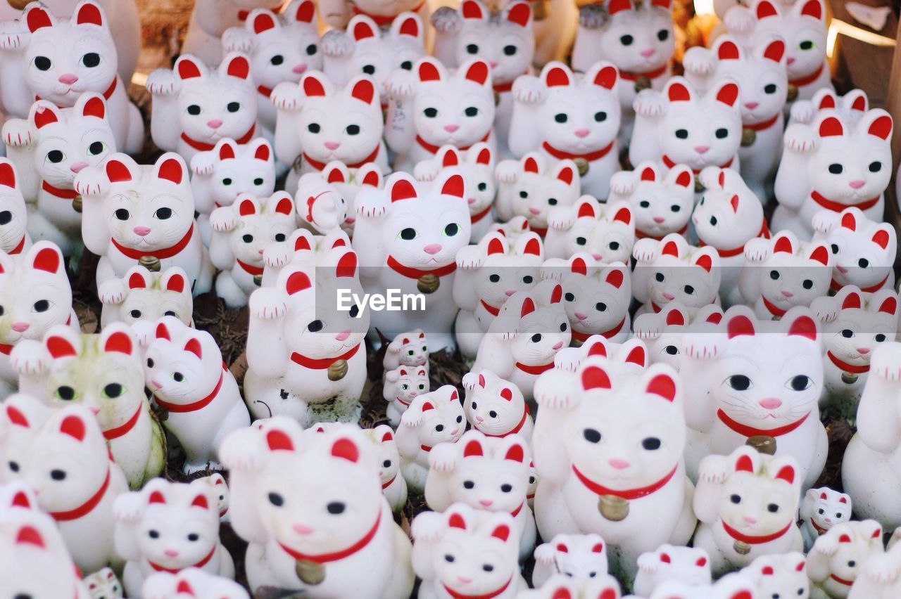 High angle view of maneki nekos at gotokuji temple