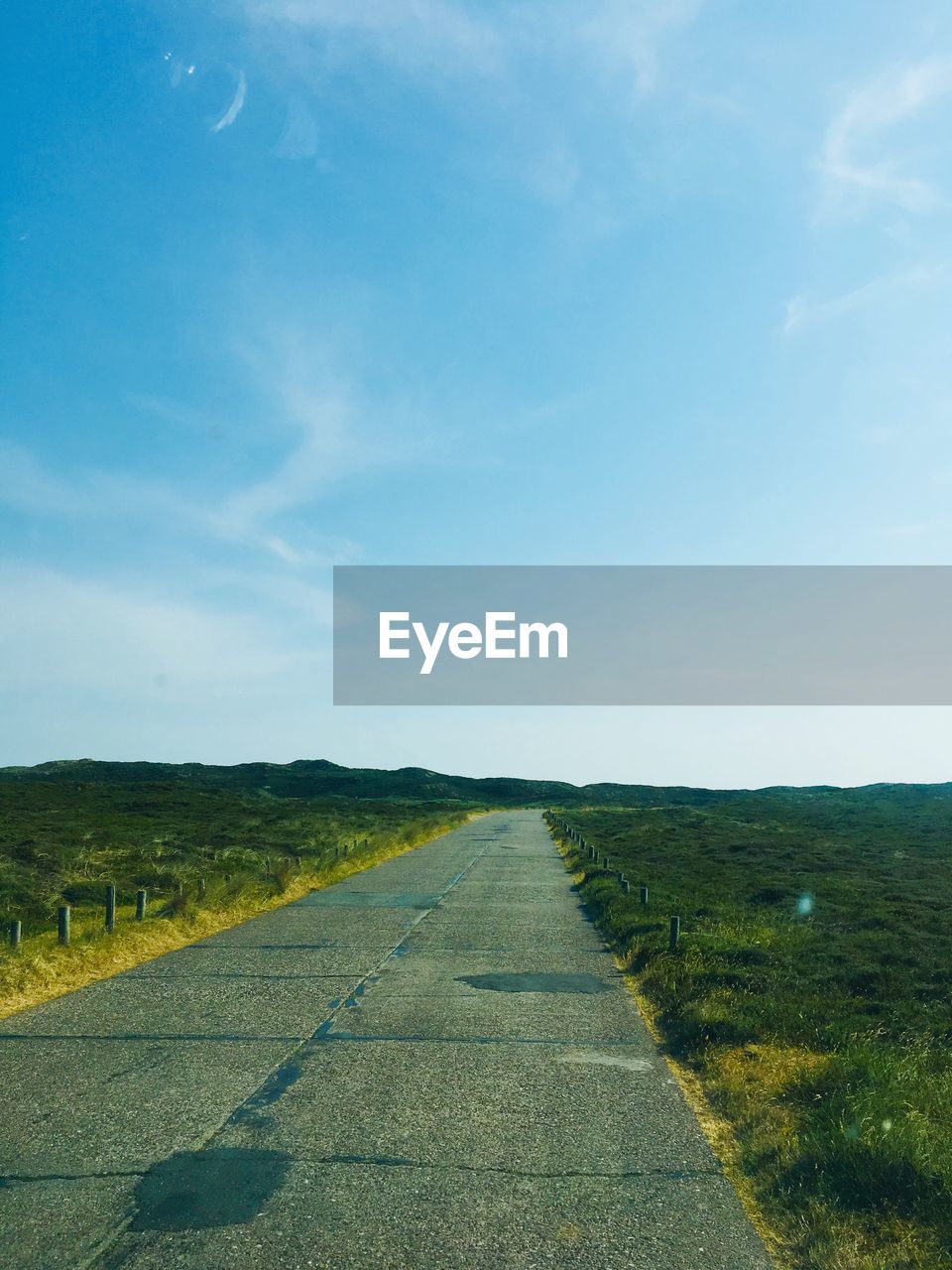 EMPTY ROAD ALONG LANDSCAPE
