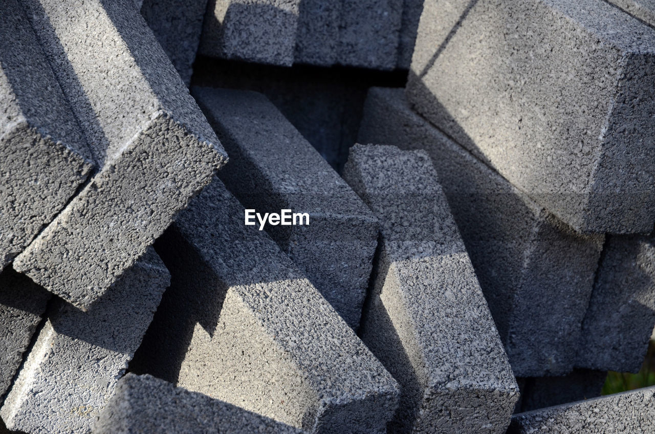 Full frame shot of pile of concrete building blocks