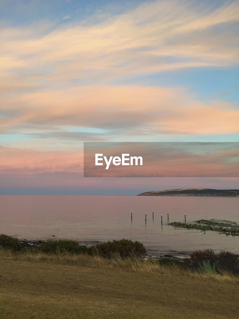 Scenic view of sunset over sea