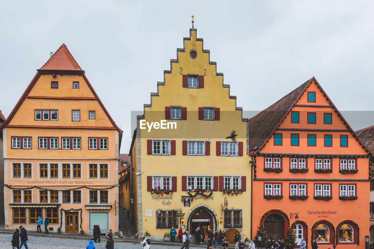 BUILDINGS IN CITY AGAINST SKY