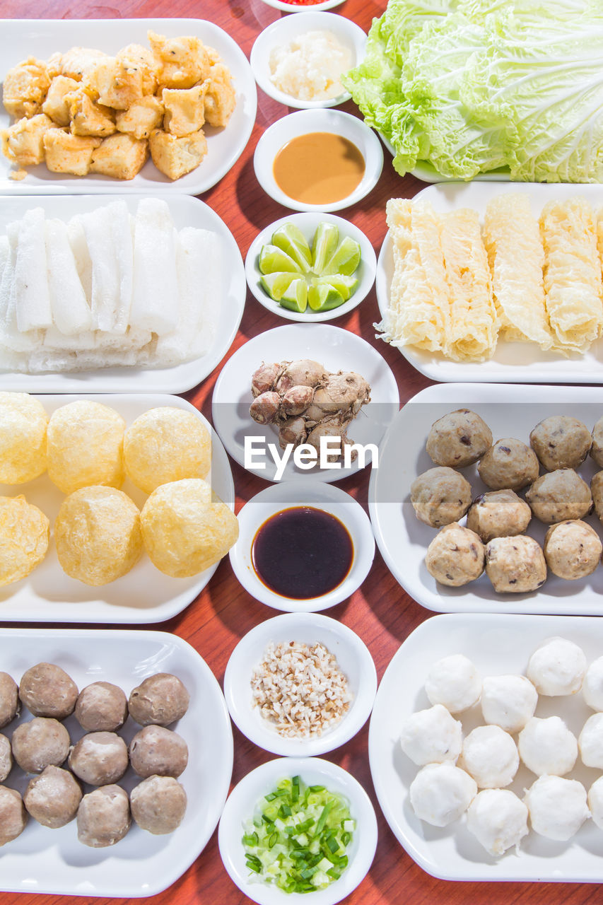 HIGH ANGLE VIEW OF VARIOUS FRUITS IN BOWL ON TABLE