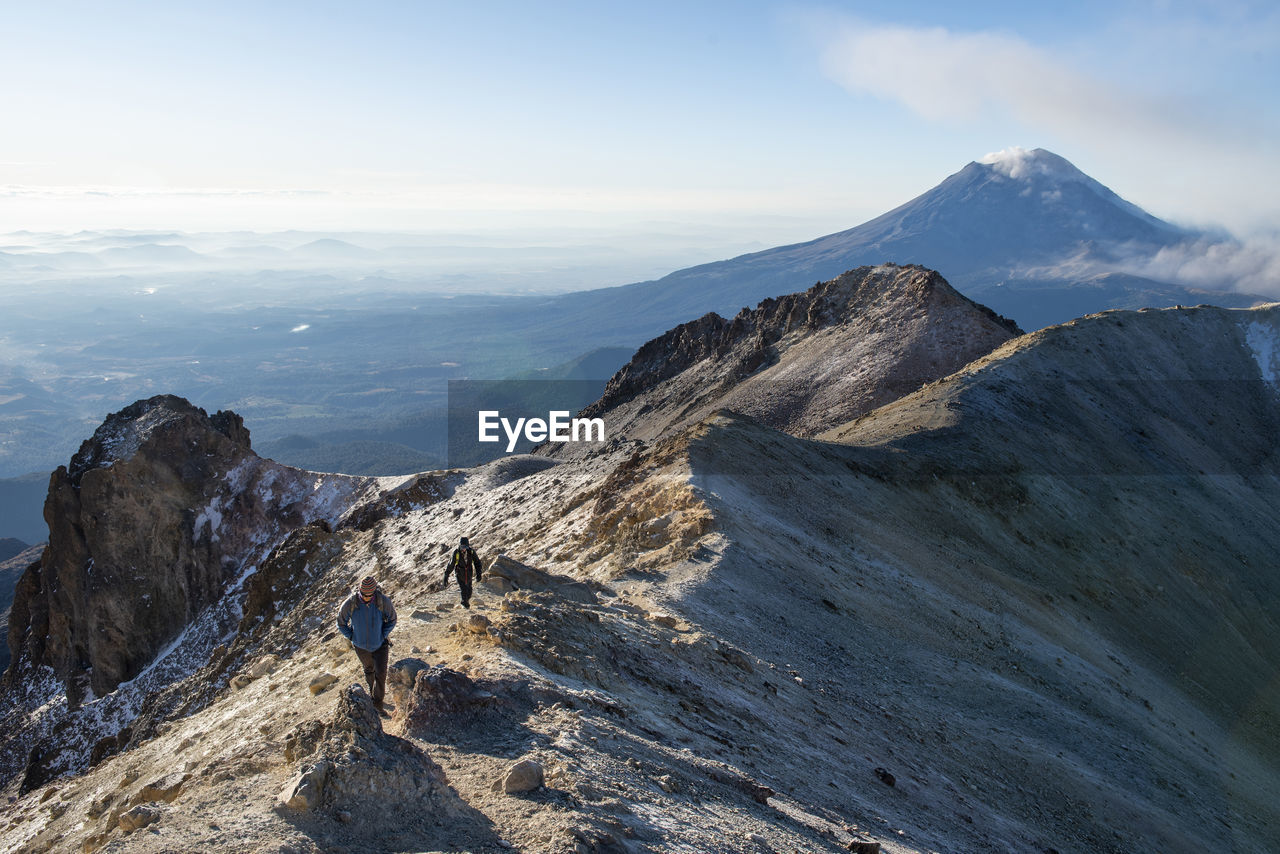 Two people climbing iztaccihuatl volcano in mexico