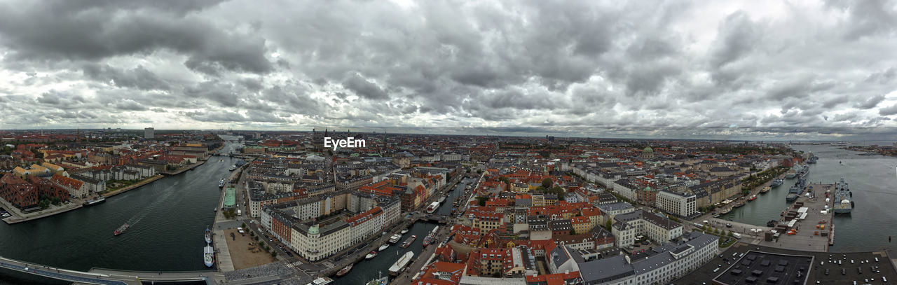 PANORAMIC VIEW OF CITYSCAPE AGAINST SKY