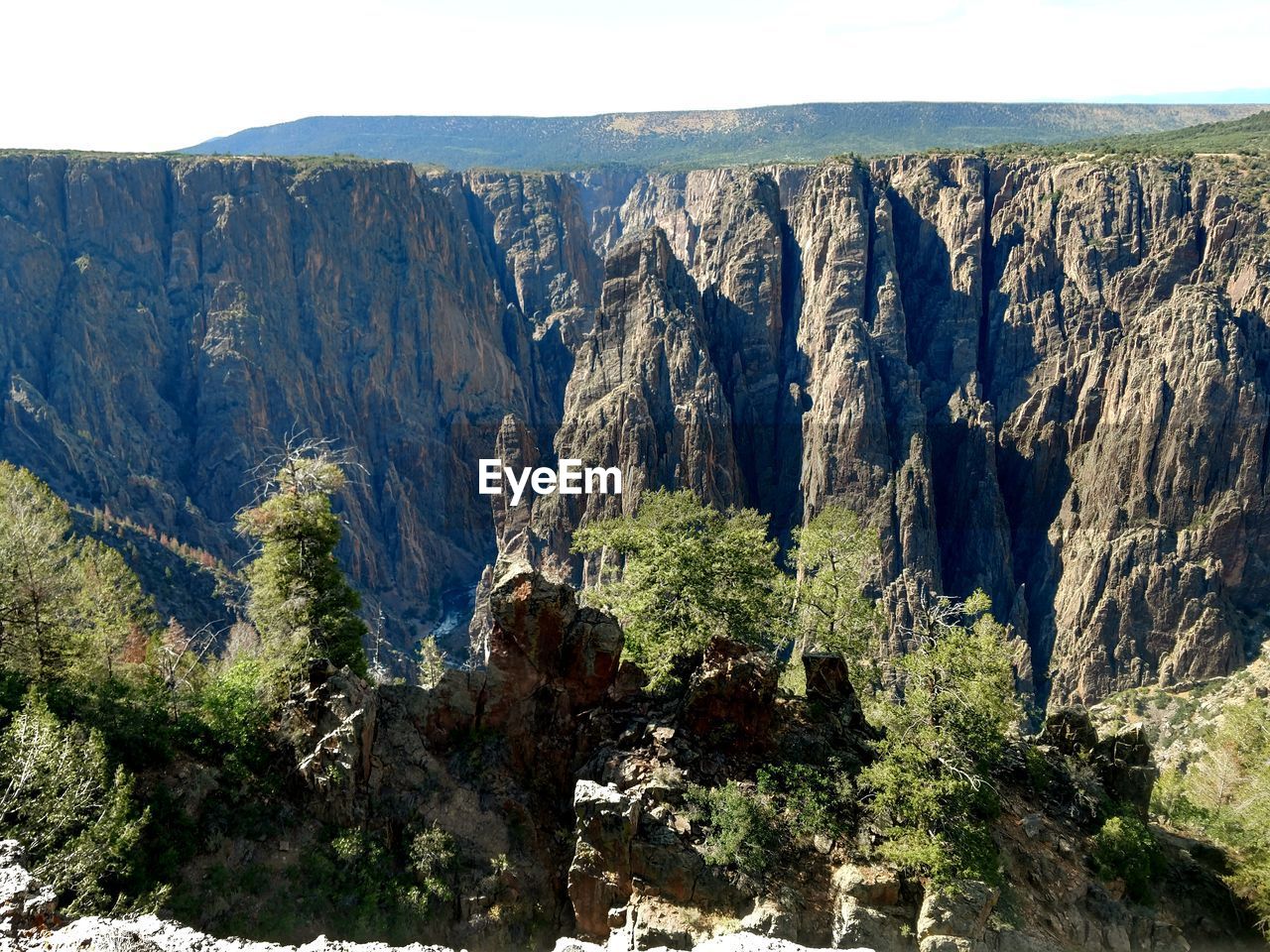 PANORAMIC VIEW OF LANDSCAPE AND MOUNTAINS
