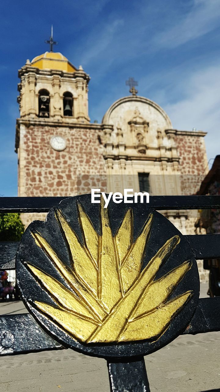 LOW ANGLE VIEW OF CLOCK TOWER