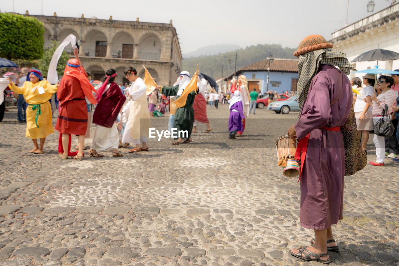 People performing on street during semana santa