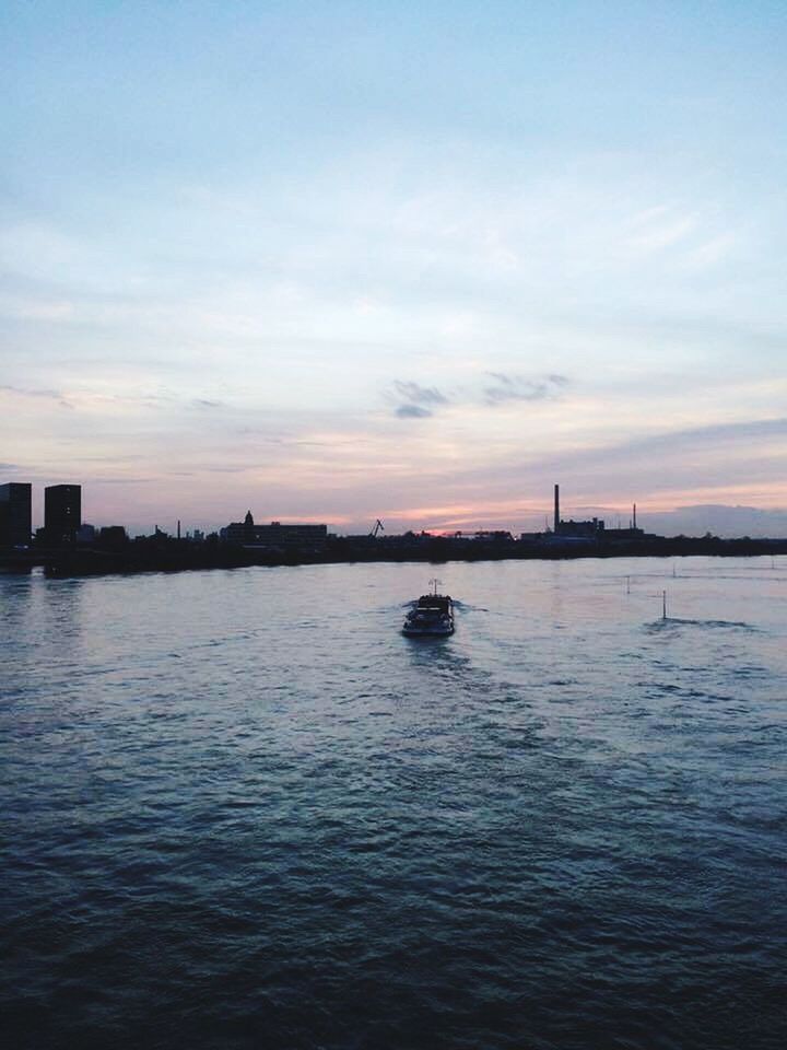 SCENIC VIEW OF RIVER AT SUNSET