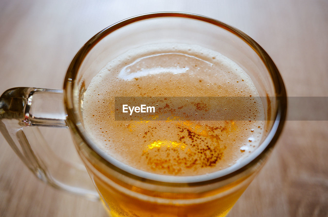 food and drink, drink, refreshment, mug, drinking glass, glass, indoors, frothy drink, table, still life, cup, household equipment, close-up, food, freshness, hot drink, coffee, latte, high angle view, no people, masala chai, produce, beer, tea, beer glass, coffee cup