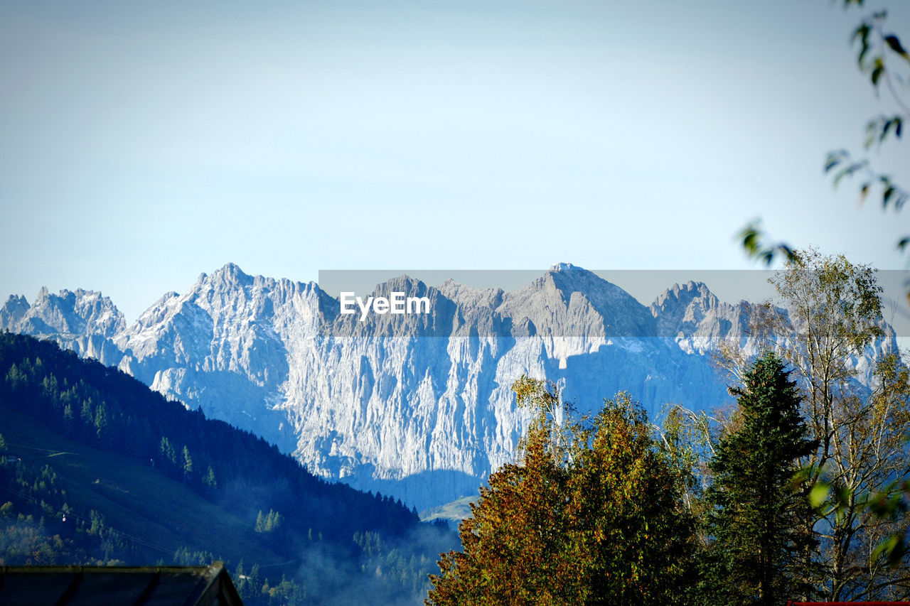 Scenic view of snowcapped mountains against sky