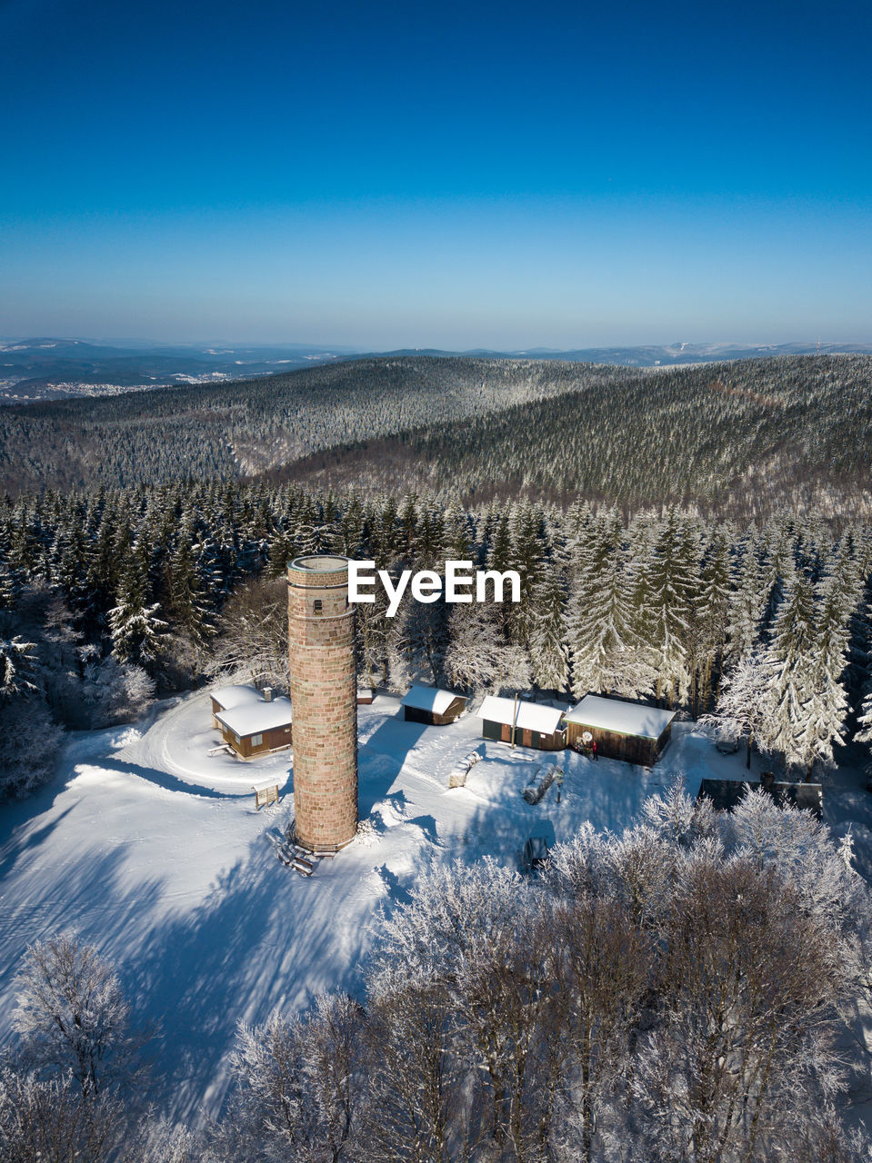 AERIAL VIEW OF FIELD AGAINST SKY DURING WINTER