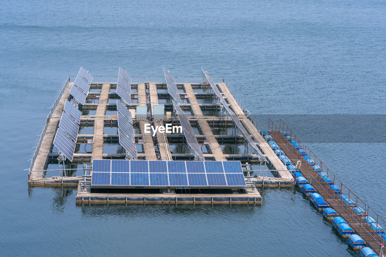 High angle view of solar panels in sea