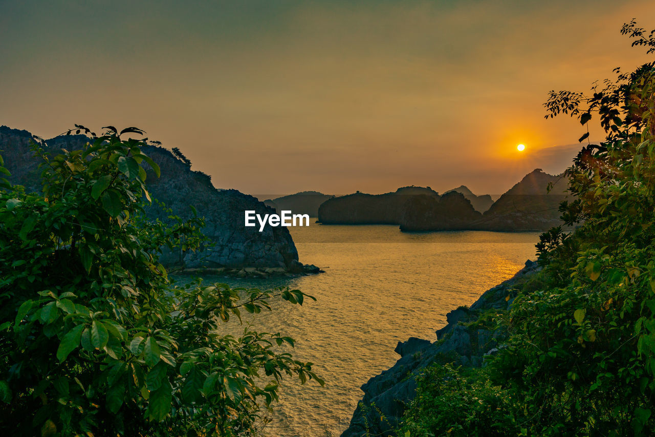 Scenic view of sea against sky during sunset