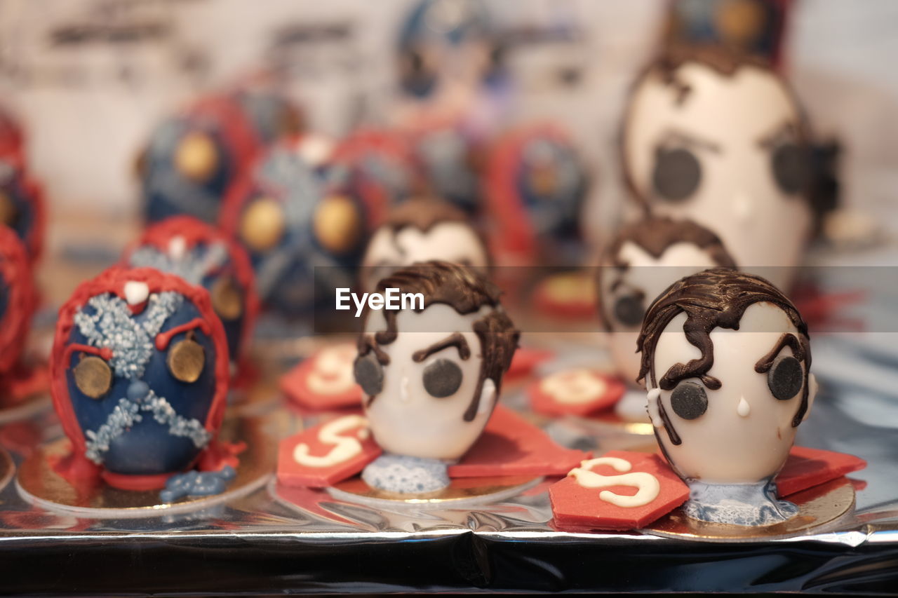 CLOSE-UP OF STUFFED TOY ON TABLE AT HOME