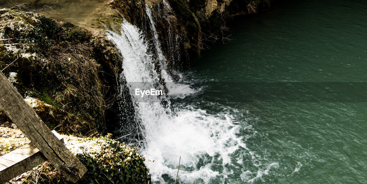 SCENIC VIEW OF SEA WAVES SPLASHING