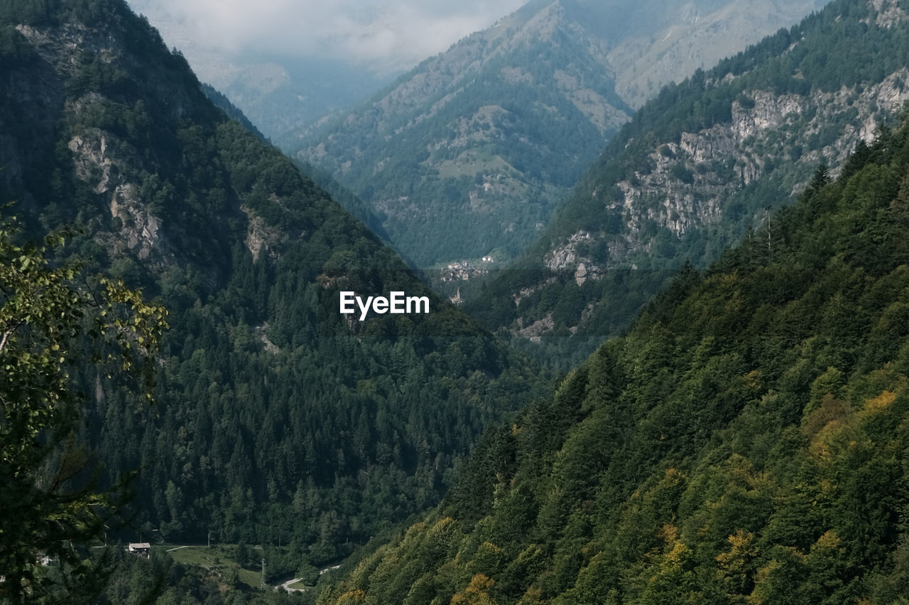 HIGH ANGLE VIEW OF VALLEY AND MOUNTAIN